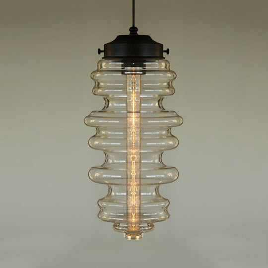 Modern 1-Light Pendant with Sleek Black Ribbed Ceiling Mount and Multi-Color Glass Shade
