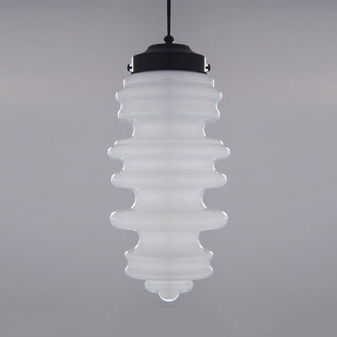 Modern 1-Light Pendant with Sleek Black Ribbed Ceiling Mount and Multi-Color Glass Shade