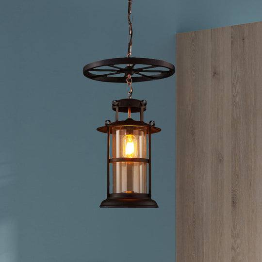 Farmhouse Black Single Light Pendant Ceiling Light with Clear Glass Cylinder and Iron Wheel Fixture