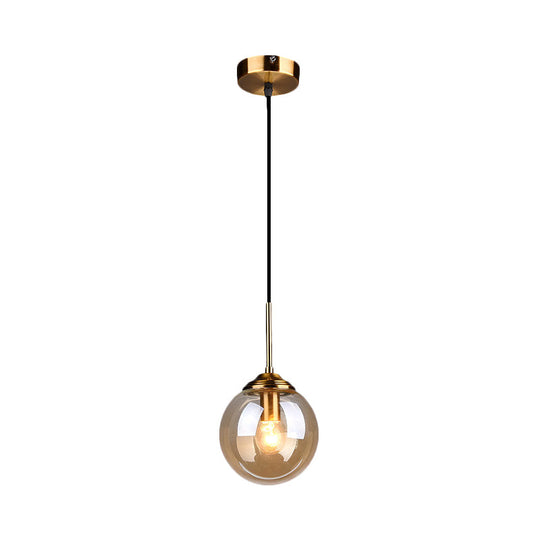 Sleek Brass Pendant Lamp with Amber/Smoke Glass Shade – Perfect for Dining Room Ceilings