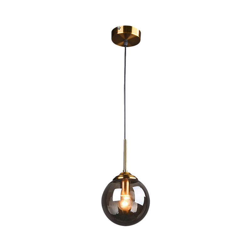 Sleek Brass Pendant Lamp with Amber/Smoke Glass Shade – Perfect for Dining Room Ceilings
