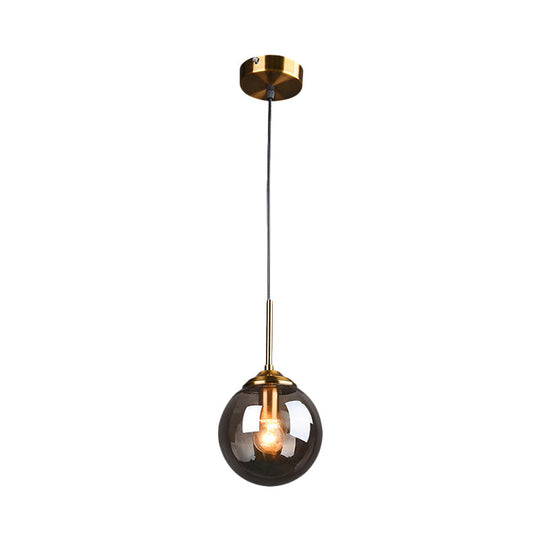 Brass Pendant Lamp With Spherical Amber/Smoke Glass Shade For Dining Room Ceiling