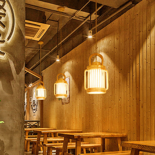 Japanese Style Single Bulb Pendant Light With Wood Cage And Fabric Shade