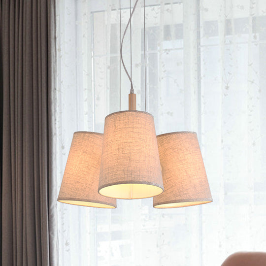 Nordic 3-Light Flaxen Cluster Pendant With Barrel Shaped Fabric Shade - Ideal For Dining Room