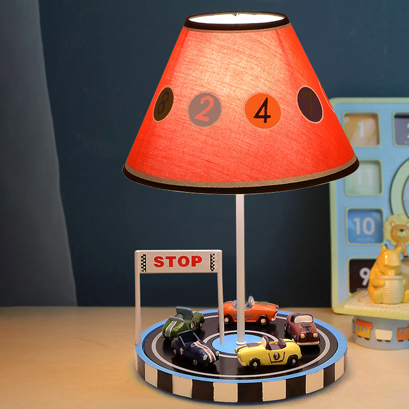 Red Racing Vehicle Tapered Fabric Table Light For Kids - 1-Bulb Nightstand Lighting