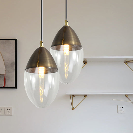 Sleek Postmodern Ellipsoid Pendant Light - Clear/Amber Glass LED, Ideal for Dining Room Ceiling