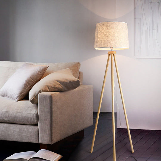 Minimalistic Tripod Floor Lamp With White Drum Shade - 1 Light Fabric