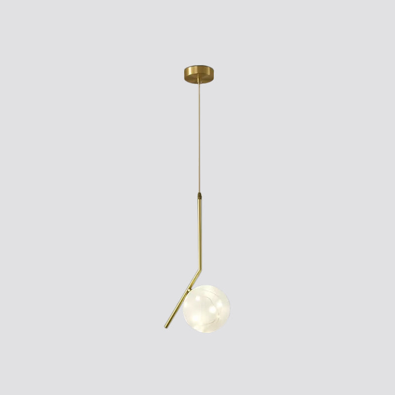 Suspension LED en laiton et verre : plafonnier sphérique moderne pour salle à manger