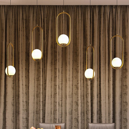 Modern Opal Glass Globe Pendant Light with Gold Finish and Oval Frame