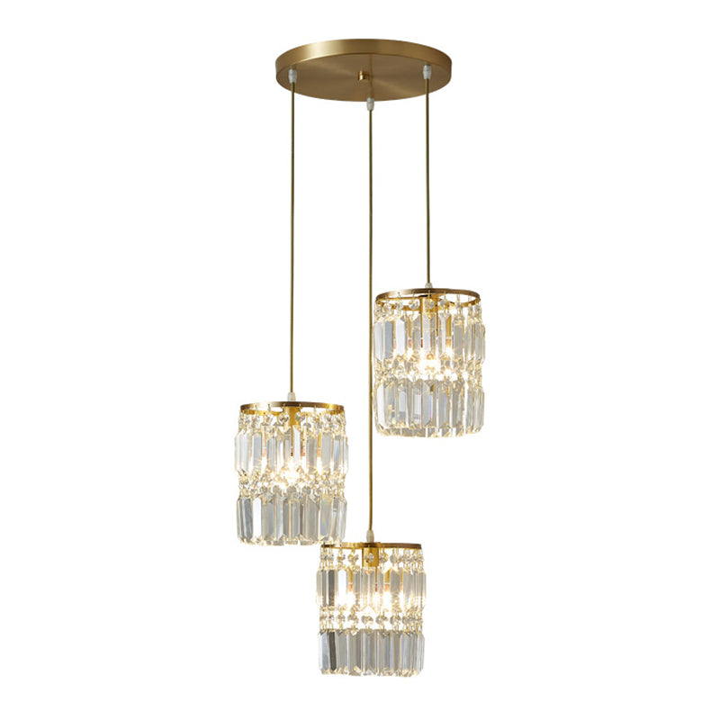 Lustre multi-lumières en laiton avec suspension cylindrique et cristal à trois prismes pour salle à manger contemporaine