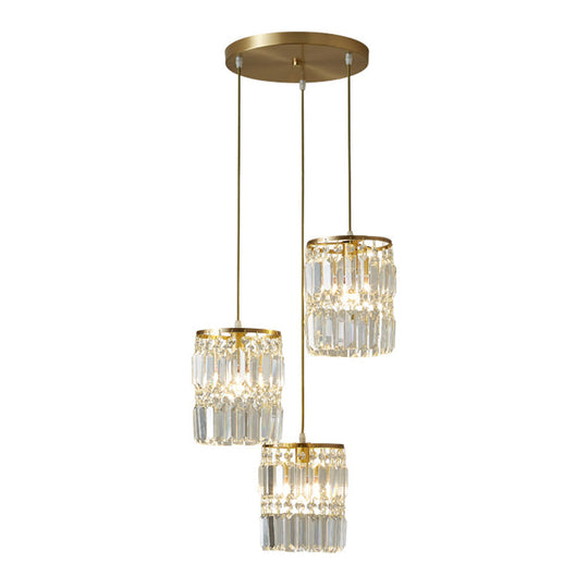 Lustre multi-lumières en laiton avec suspension cylindrique et cristal à trois prismes pour salle à manger contemporaine
