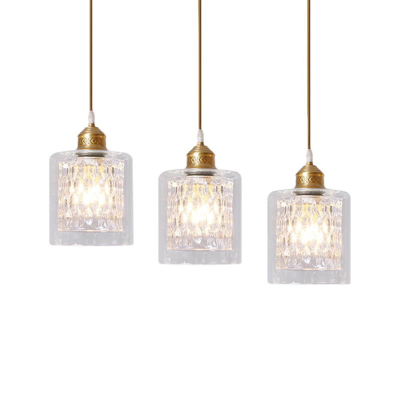 Modern Brass Cylinder Pendant Light with Prismatic Glass Shade - 3 Lights, Linear/Round Canopy