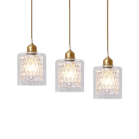 Modern Brass Cylinder Pendant Light with Prismatic Glass Shade - 3 Lights, Linear/Round Canopy
