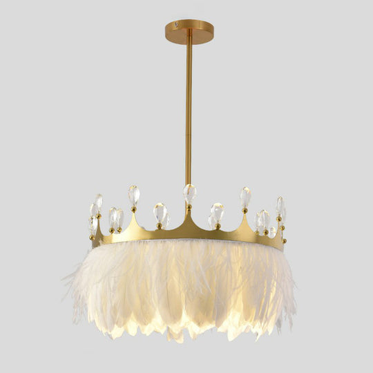 Modern Single Gold Crown Pendant Light with Crystal and Feather Accents - Metallic Suspension Fixture