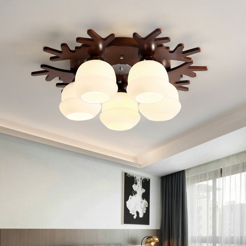 Nordic-style Wood Flush Ceiling Light with Antler Design and White Glass Shade
