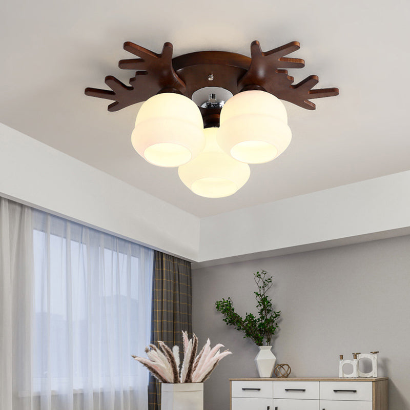 Nordic-style Wood Flush Ceiling Light with Antler Design and White Glass Shade