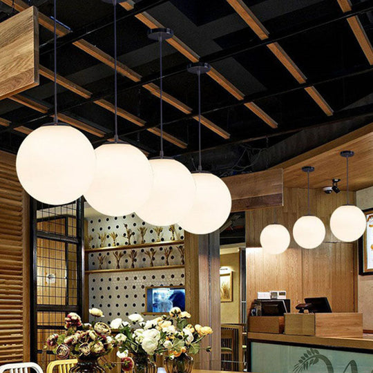 Modern White Glass Pendant Lamp - Opaque Spherical Design for Dining Room Lighting