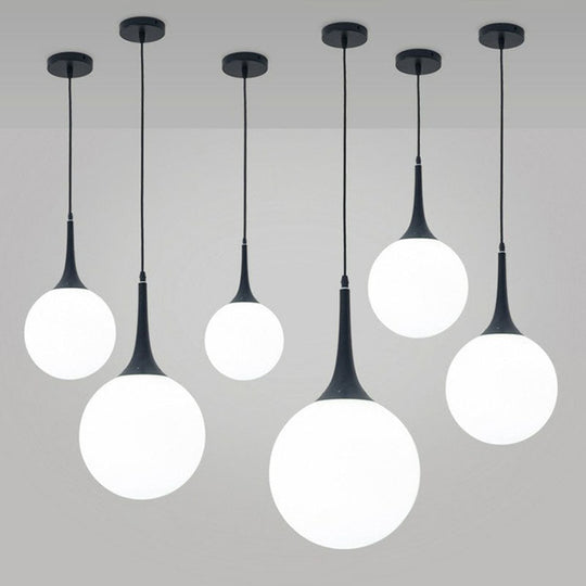 Sleek Cream Glass Pendant Light For Dining Room Minimalist Spherical Suspension