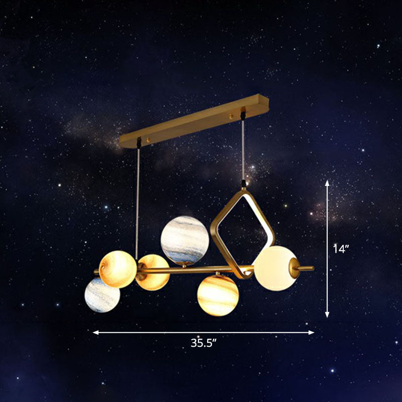 Lampe suspendue Nordic Planet à 7 têtes en verre teinté doré pour salle à manger