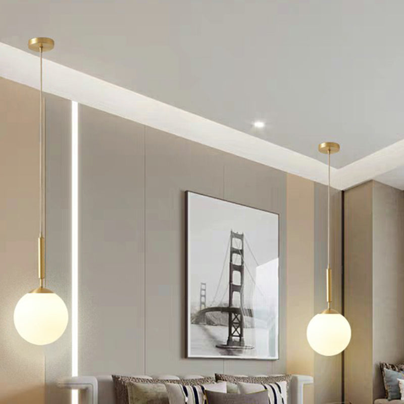 Milk Glass Ball Pendant Light With Brass Finish - Minimalist 1-Light Dining Room Fixture