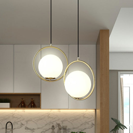 Globe Milky Glass 1-Bulb Pendant Light with Brass Loop – Modern Dining Room Suspension Lamp