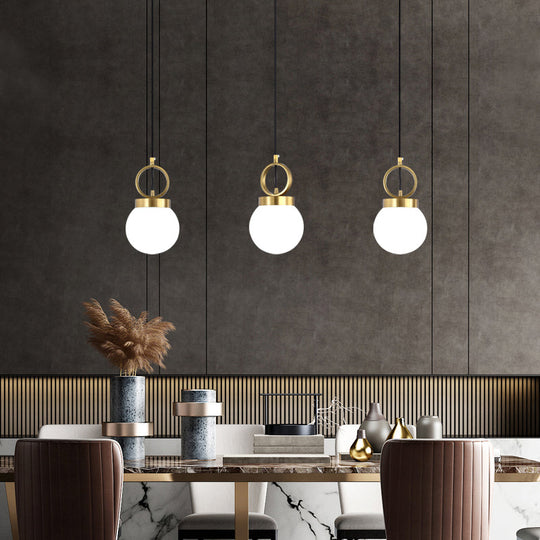 Opal Glass Dining Room Pendant Lamp with Elegant Gold Ring Top - Simplistic Ball Pendulum Light