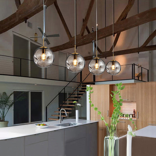 Postmodern Brass Pendant Lamp with Dimpled Glass Globe for Bedroom