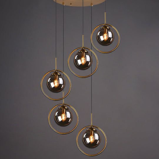 Luminaire suspendu post-moderne en forme de boule avec finition en laiton et abat-jour en verre - Suspension à 5 ampoules