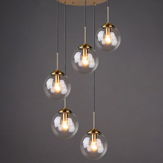 Luminaire suspendu post-moderne en forme de boule avec finition en laiton et abat-jour en verre - Suspension à 5 ampoules