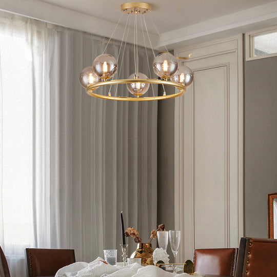 Postmodern Metal Pendant Chandelier With Glass Ball Shade