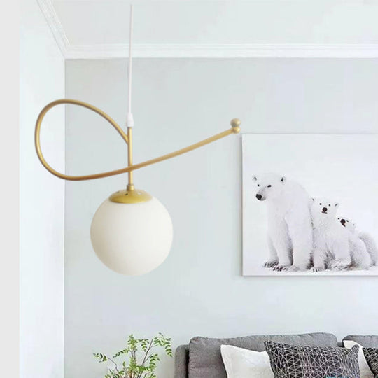 Gold Finished Bedroom Pendant Light With Contemporary Globe Shade In White Glass