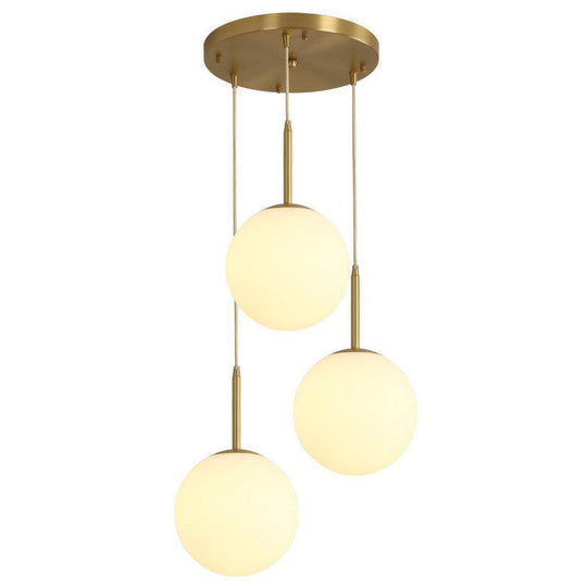 Minimalist Opal Glass Sphere Pendant Light with 3-Bulb Gold Pendulum Design - Ideal for Dining Room