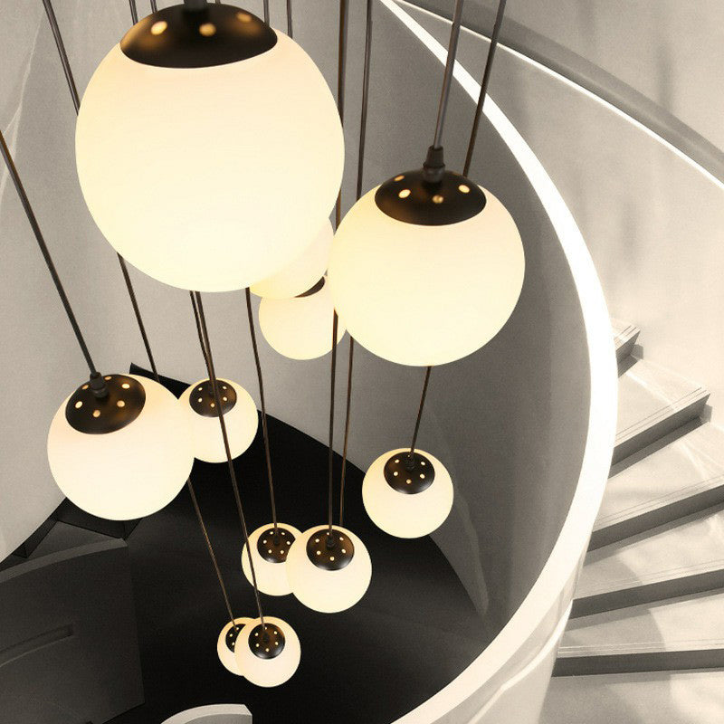 Minimalist Black Globe Pendant Light with Cream Glass - Ideal for Stairways