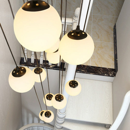 Minimalist Black Globe Pendant Light with Cream Glass - Ideal for Stairways