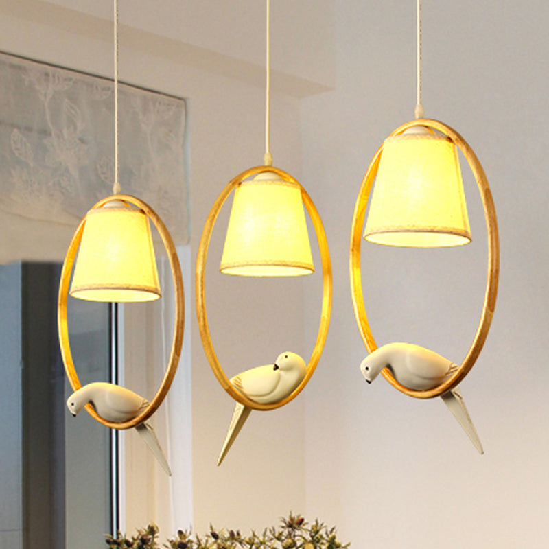Contemporary Cone Fabric Pendant Lamp with Wood Ring and Resin Bird - 1/3 Lights, White Fixture