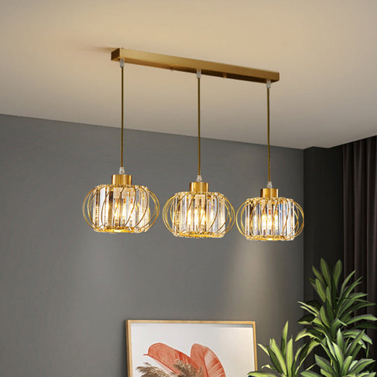 Modern Brass Globe Pendant Light With Crystal Accents Stylish Ceiling Lantern For Dining Area