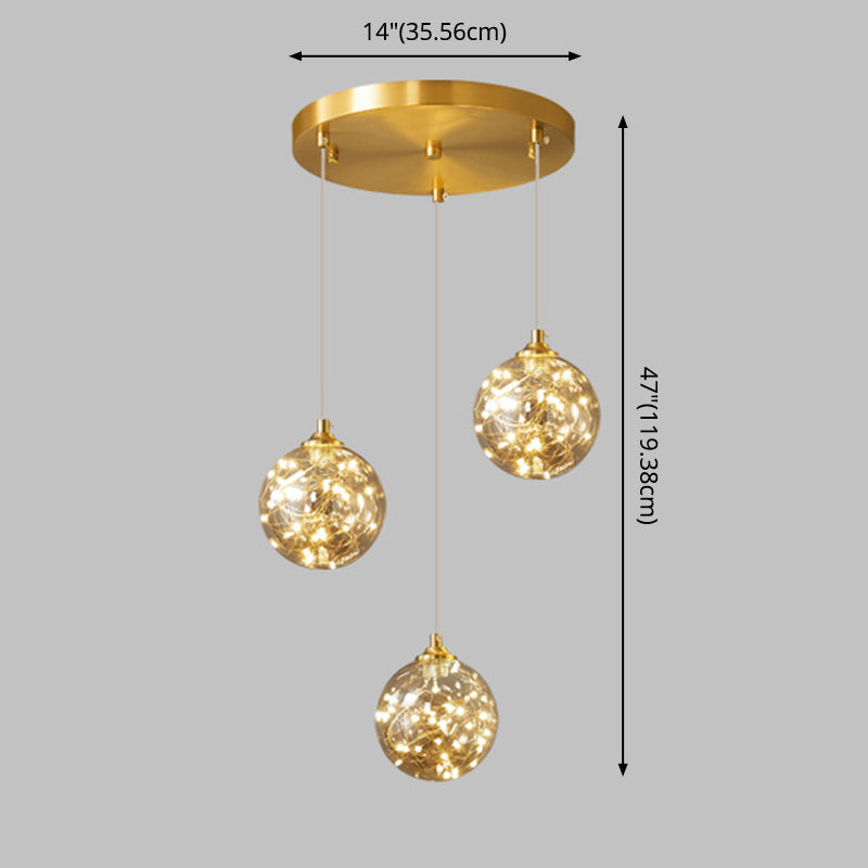 Nordic Amber Glass LED Pendant Lamp with Brass Finish and Starry Design for Bedroom