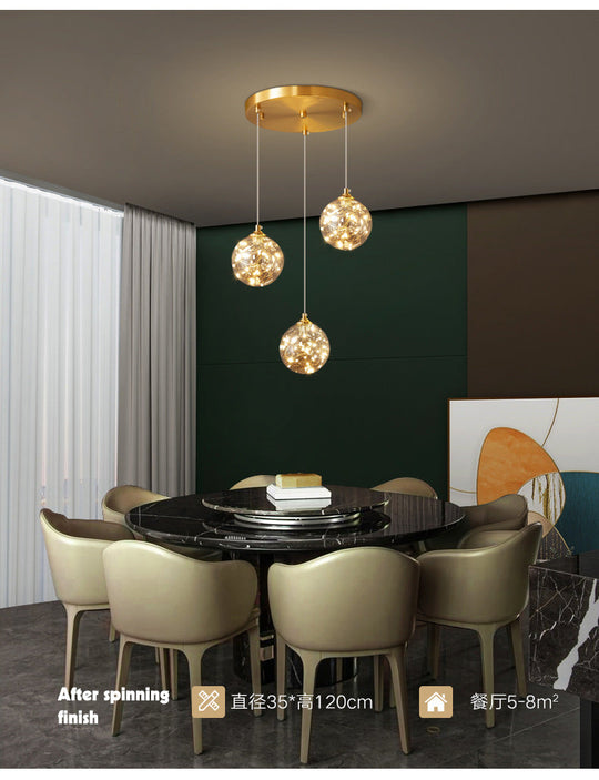 Nordic Amber Glass LED Pendant Lamp with Brass Finish and Starry Design for Bedroom