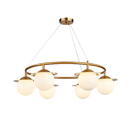 Lustre moderne en forme de sphère dorée avec 6 ampoules et verre blanc - Lampe à suspension élégante
