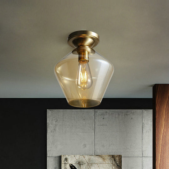 Contemporary Brass Flush Ceiling Fixture with Amber Glass Lampshade