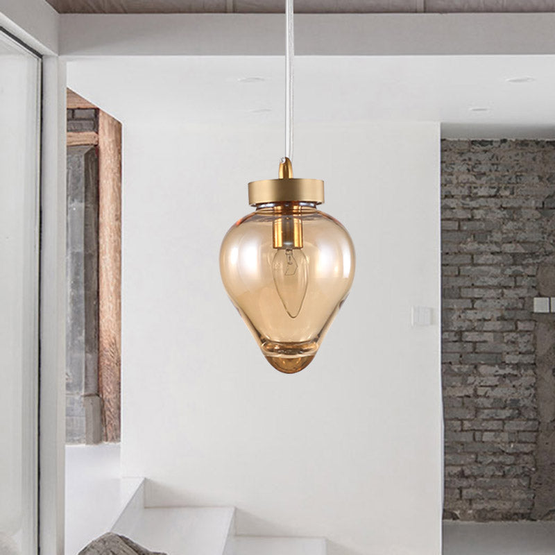 Modern Amber Glass Pendant With Gold Urn Design - Perfect For Dining Room Lighting