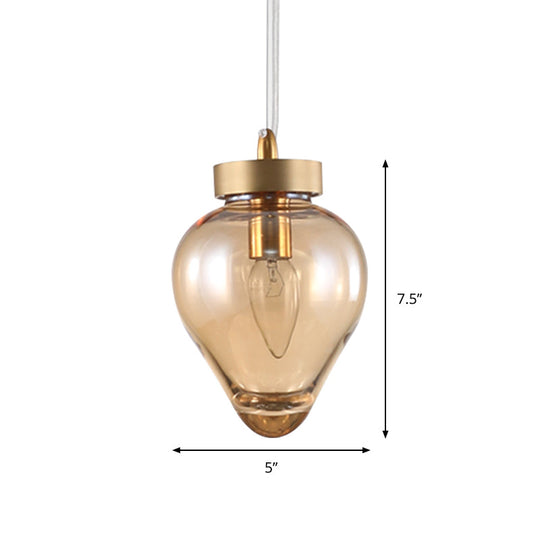Modern Amber Glass Pendant With Gold Urn Design - Perfect For Dining Room Lighting