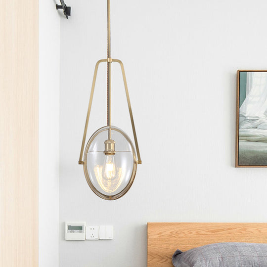 Sleek Gold Elliptical Hanging Ceiling Light With Clear Glass Drop - Ideal For Dining Room 1 Head