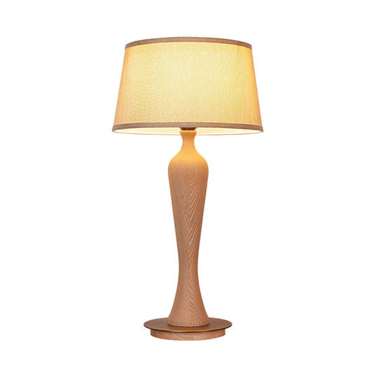 Modern Urn-Shaped Wood Desk Lamp In Beige - 1 Bulb Table Light With Drum Fabric Shade