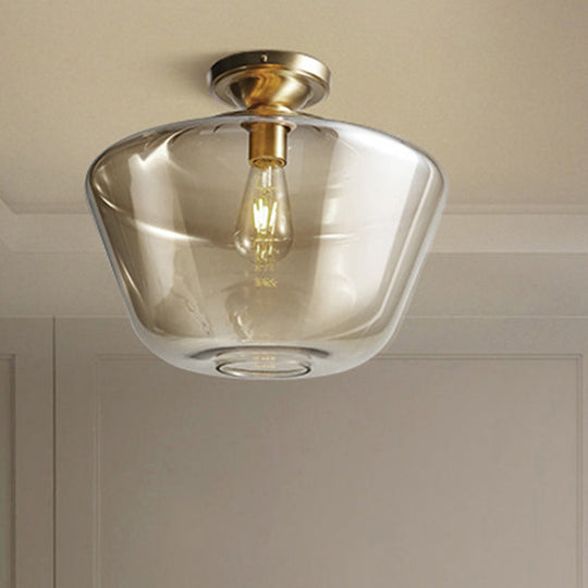 Contemporary Brass Flush Ceiling Fixture with Amber Glass Lampshade