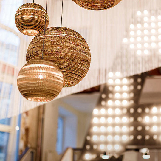 Asian Stylish Brown Corrugated Paper Pendant Lamp with Drum Shape and Globe Design - 1 Light Indoor Suspension Light