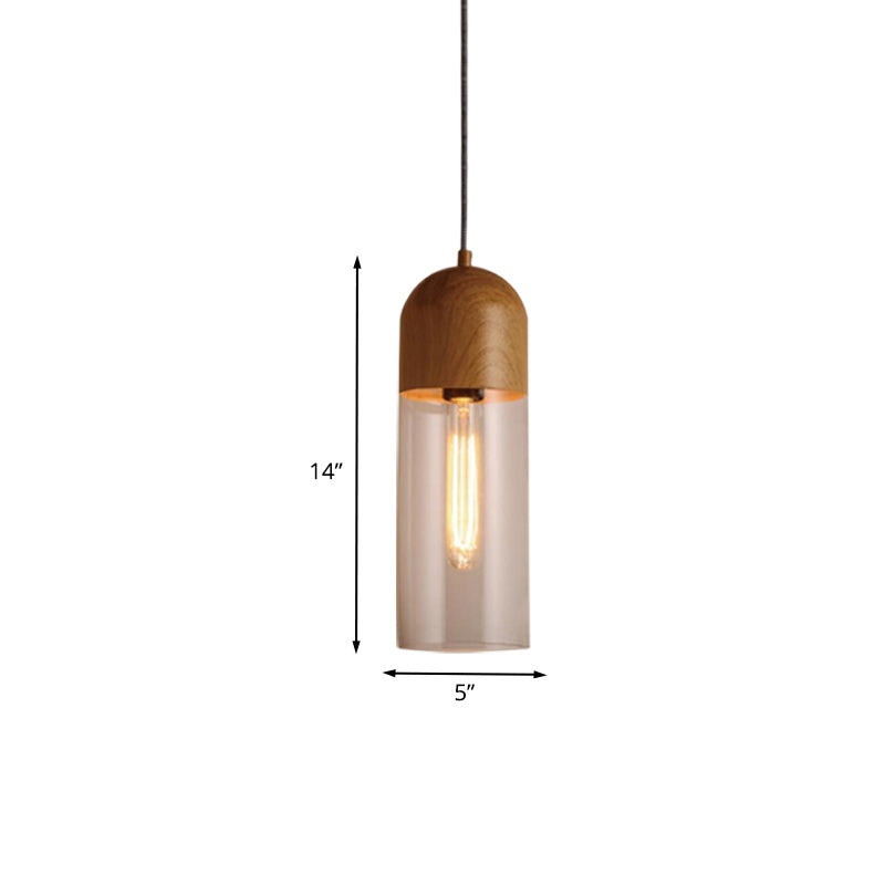 Modern Clear Glass Pendant Light: Sleek Half-Capsule Design, Wood Fixture for Bedroom