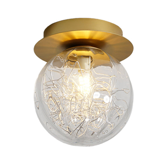Modern Gold Pumpkin Ball Flush Light Fixture with Clear Glass Shade and Metal Line Inside