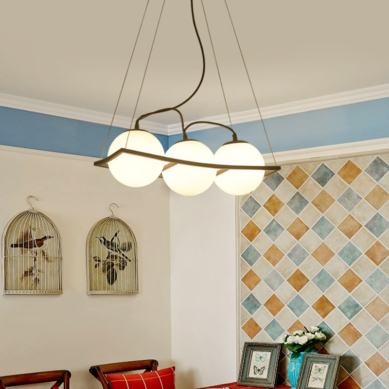 Modernist Frosted Glass Pendant Light With Globe Design - 3/4 Lights Black Frame For Ceiling Hang 3