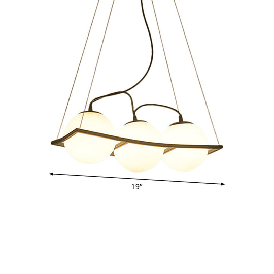 Modernist Frosted Glass Pendant Light With Globe Design - 3/4 Lights Black Frame For Ceiling Hang